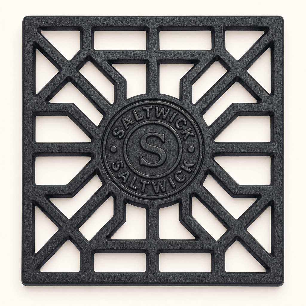 Saltwick cast iron trivet with Saltwick cast into the iron